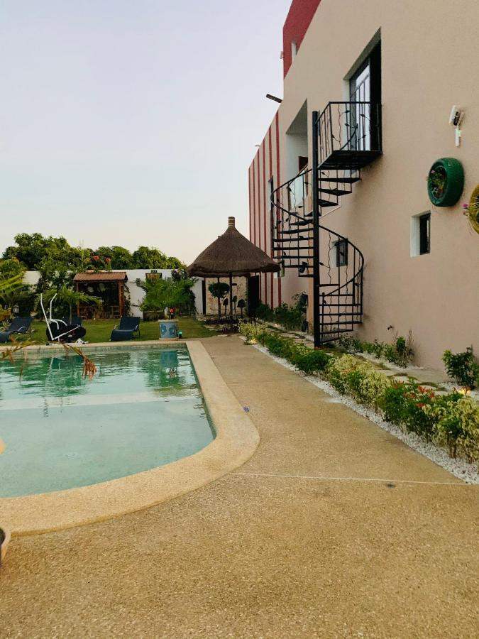 Le Diamant Noir Hotel Nguekokh Exterior photo